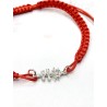 Red Caravaca Cross bracelet made of macramé and silver