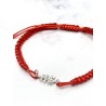 Red Caravaca Cross bracelet made of macramé and silver