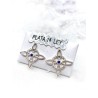 Pendientes 'Bridget' de Nudo Brujas y Topacio azul