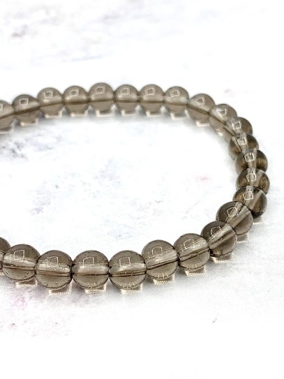 Pulsera 'Asha' de Cuarzo ahumado 6mm | Trabajo y protección
