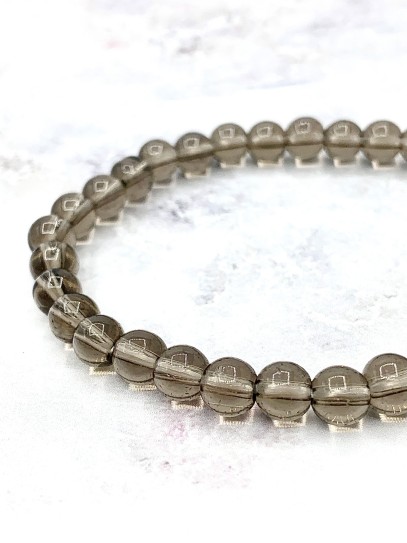 Pulsera 'Asha' de Cuarzo ahumado 6mm | Trabajo y protección