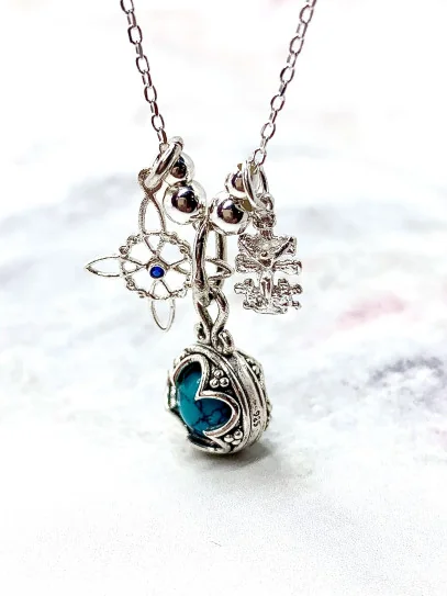 Collar triple protección de plata: Gotland Turquesa mini, Nudo de Bruja y Cruz de Caravaca