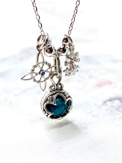Triple protection silver necklace: Gotland Turquoise Mini, Witches Knot and Caravaca Cross
