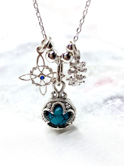 Triple protection silver necklace: Gotland Turquoise Mini, Witches Knot and Caravaca Cross