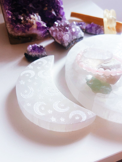 Engraved moon-shaped selenite plaque