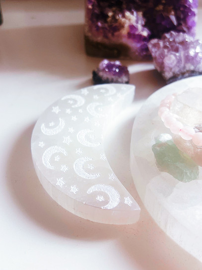 Engraved moon-shaped selenite plaque