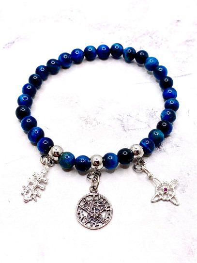 Pulsera triple protección de plata: Tetragramatón, Cruz de Caravaca y San Benito con Ojo de Tigre azul