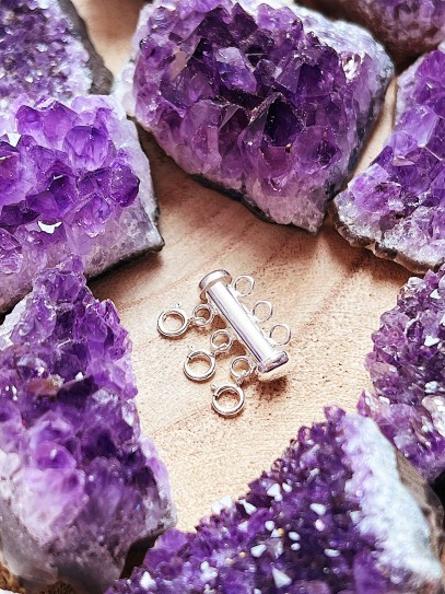 Tancament per a tres collarets