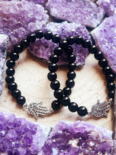 Pulsera 'Asha' de Ónix negro con Mano de Fátima 8mm | Protección y mal de ojo