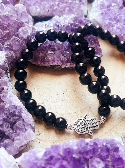 Pulsera 'Asha' de Ónix negro con Mano de Fátima 8mm | Protección y mal de ojo